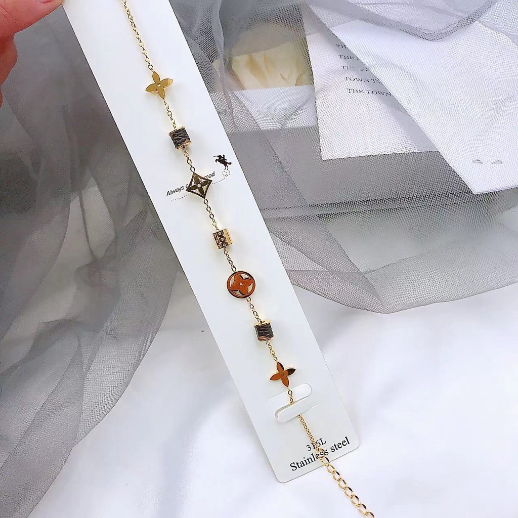 Vòng Đeo Tay Bằng Thép Không Gỉ Mạ Vàng Họa Tiết Hoa Lá Bốn Lá Thời Trang Đơn Giản