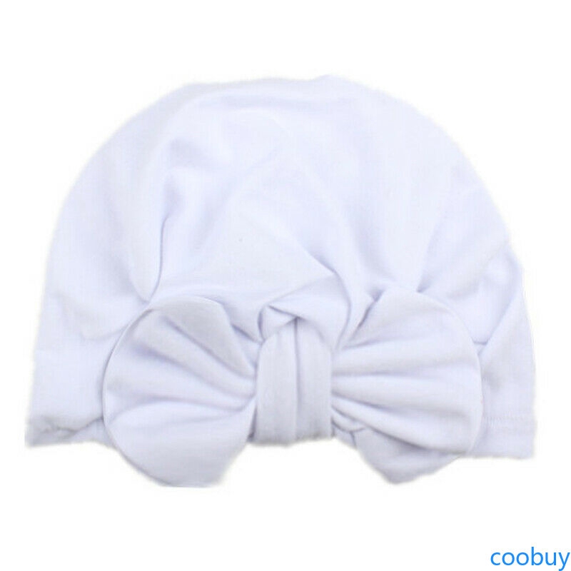 Mũ trùm đầu đính nơ đáng yêu cho bé