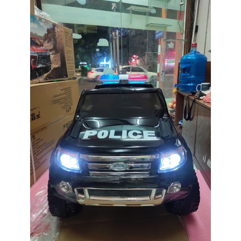 Ô tô điện bán tải cảnh sát kiểu dáng Ford Ranger 150-X6 ghế da,4 động cơ,có còi hú