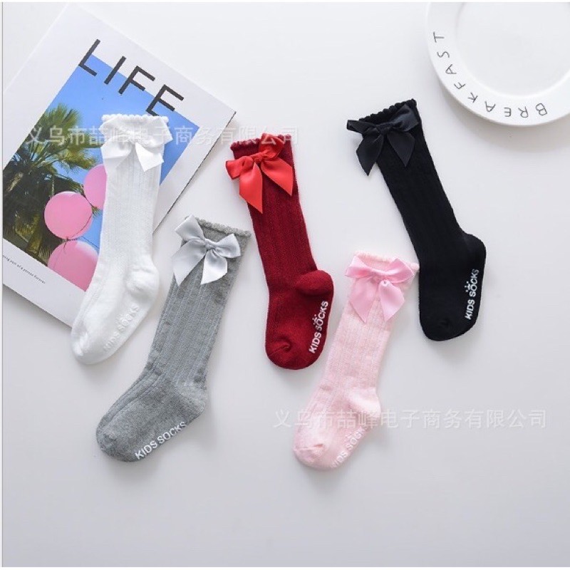 vớ dài đính nơ cho bé gái