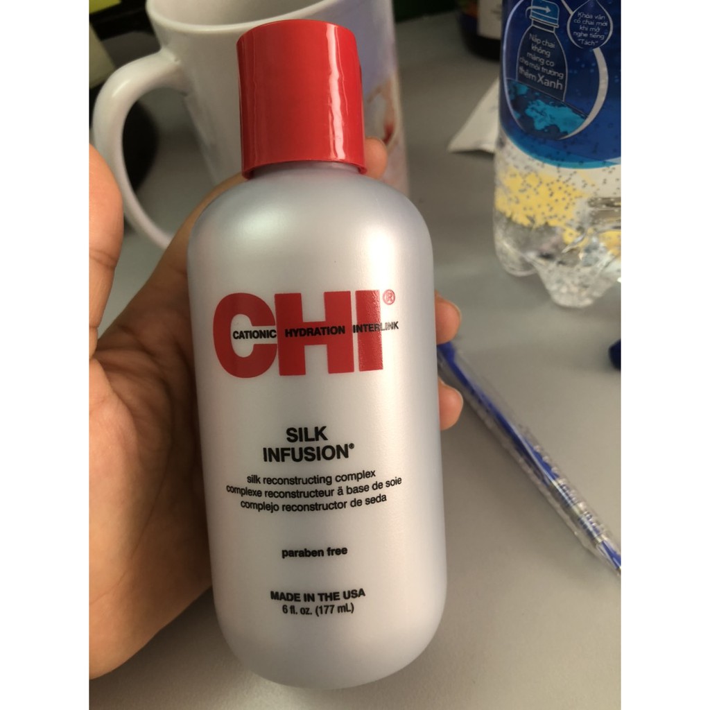Tinh dầu dưỡng tóc mềm mượt và óng ả CHI Silk Infusion 177ml ( hàng nội địa Mĩ)