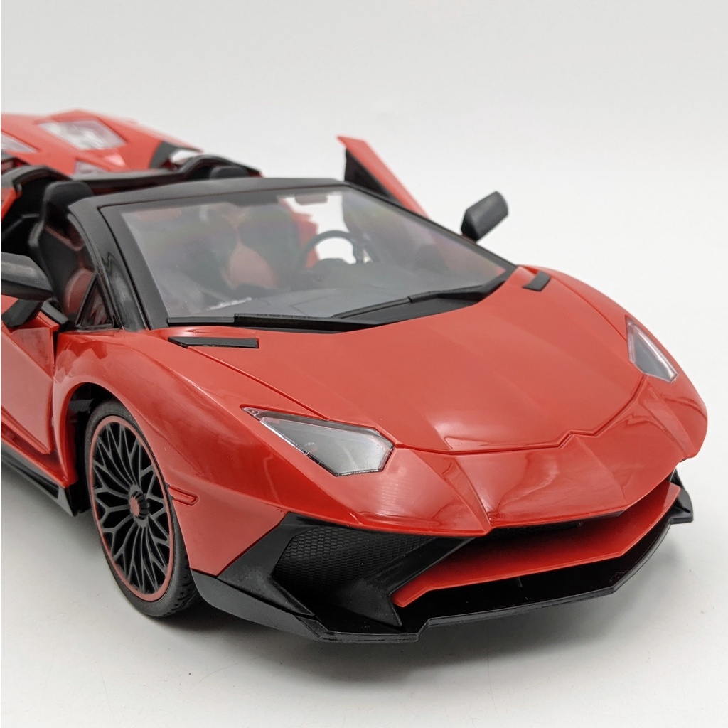 Xe thể thao Lamborghini điều khiển bằng vô lăng cảm biến - Pin sạc - Tỉ lệ 1:12