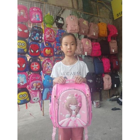 Kho sỉ  Cặp/ balo đựng sách vở chống gù cho bé gái hình Hello Kitty