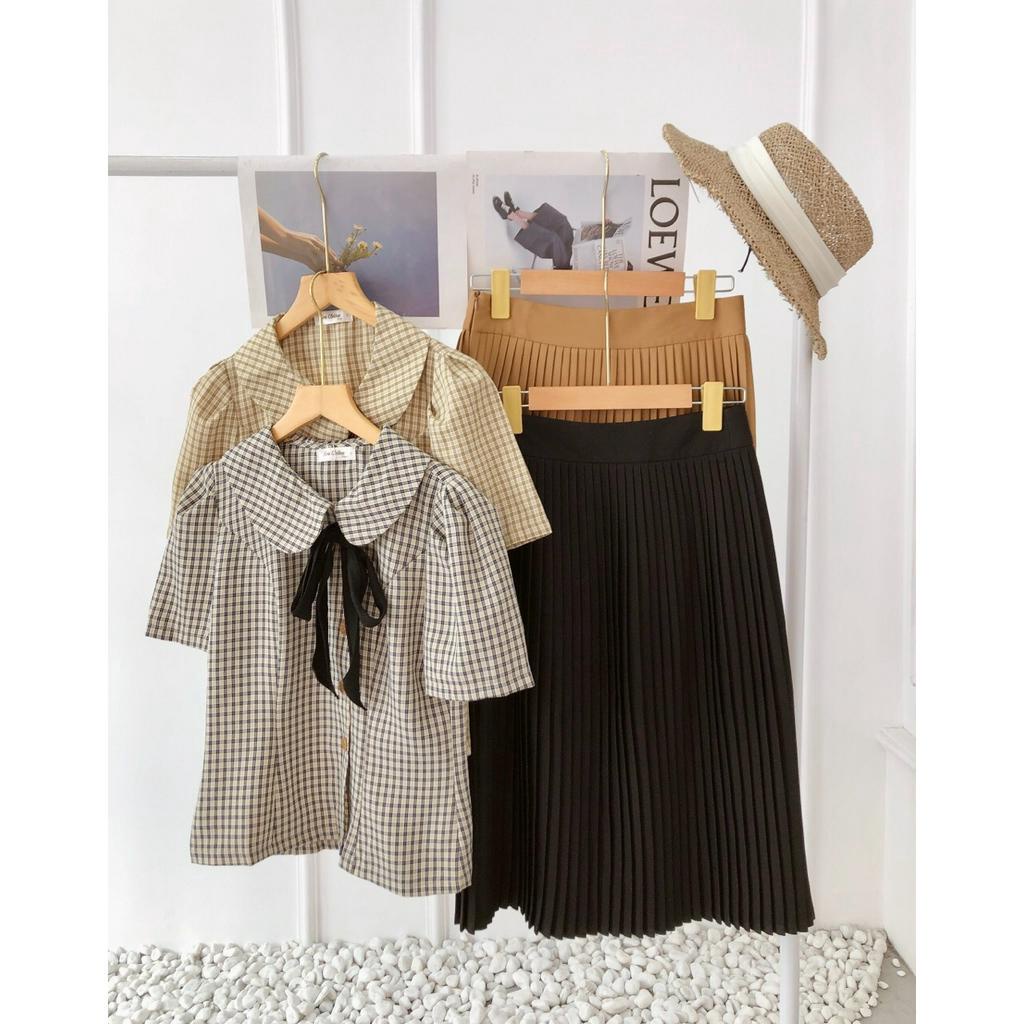 Set sơ mi chân váy công sở cổ tròn tay lỡ mix chân váy xếp ly chất liệu kate nhật hiện đại Evalover