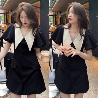 Váy thiết kế cổ nhọn tay bồng