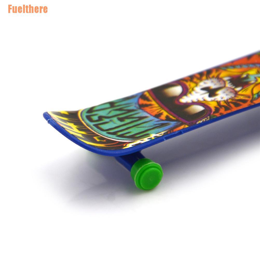 (Fuelthere) 1PCS Plastic Mini Finger Skateboarding Fingerboard Toys Skate Boarding Toys