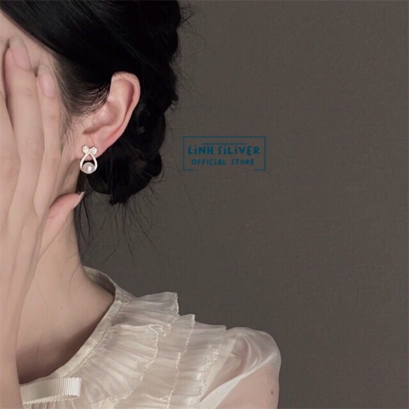 BÔNG TAI NƠ TIÊU THƯ BẠC TA