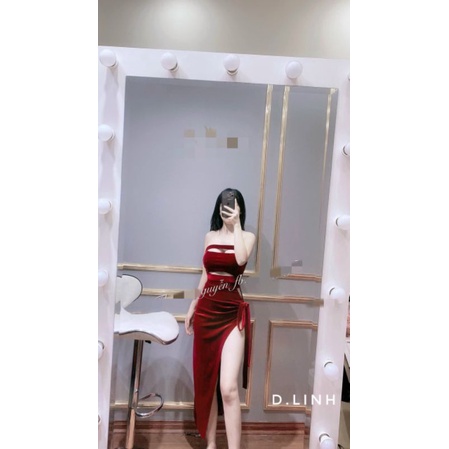 Váy Nhung body hở bụng khoét sườn chân váy vát chéo sang chảnh.
