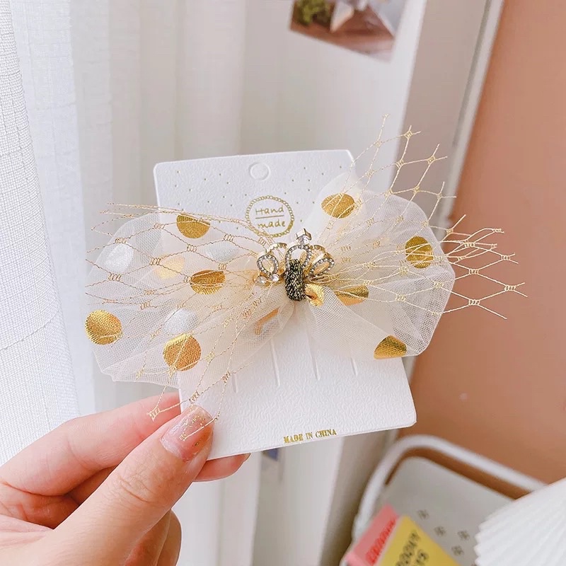 Kẹp tóc nơ tone vàng xinh xắn cho bé