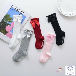 Tất đầu gối đính nơ đáng yêu cho bé gái