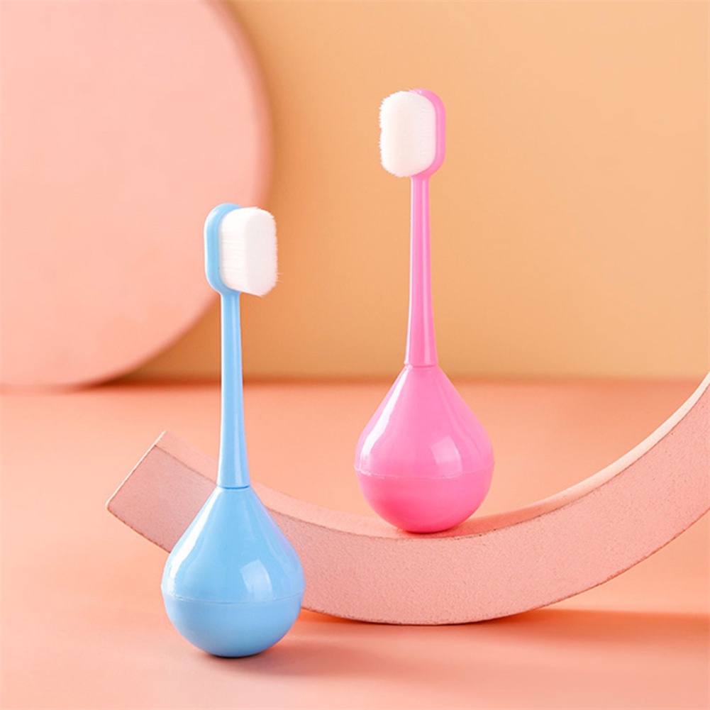 Bàn Chải Đánh Răng Bằng Silicon Mềm Thiết Kế Hình Lật Đật Cho Bé Từ 2~12 Tuổi