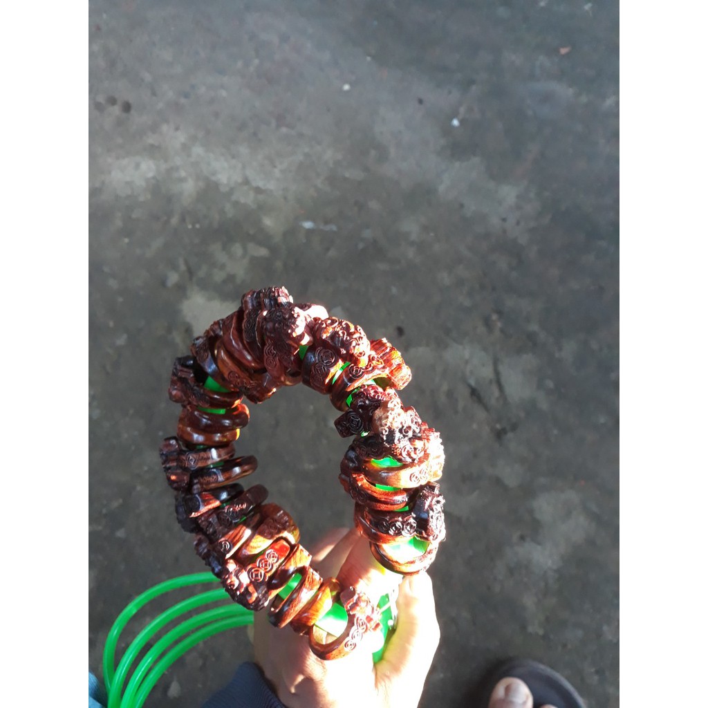 Nhẫn gỗ chạm tỳ hưu phong thủy theo yêu cầu