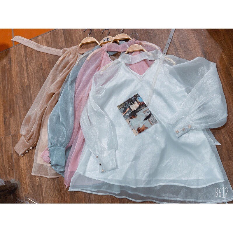 Áo sơ mi tơ đũi tay phồng siêu hót. Đủ màu cho chị em chon Xanh, Hồng, Trắng, Be, Nâu. ZADOLA FASHION