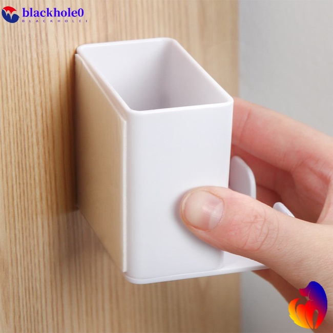 Hộp đựng điều khiển từ xa máy lạnh nhét phích cắm điện thoại treo tường