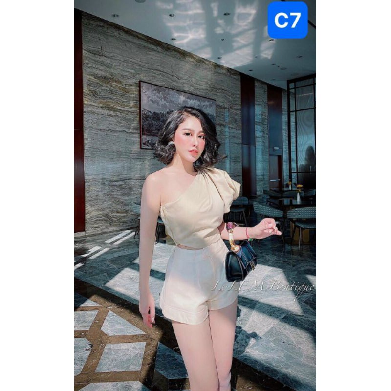 Áo tay phồng lệch vai dây kéo hông