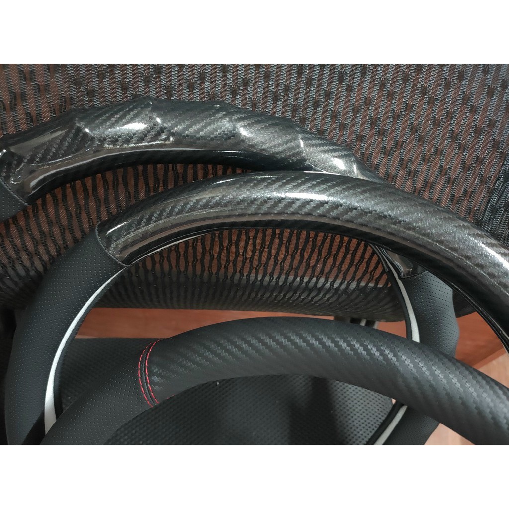 Bọc vô lăng Cao Cấp D-Cut Cho Xe SUZUKI XL7,ERTIGA,SWIFT,KIA SELTOS, SONET,ELANTRA SPORT,NISSAN ALMERA, BEJING, MG ZS