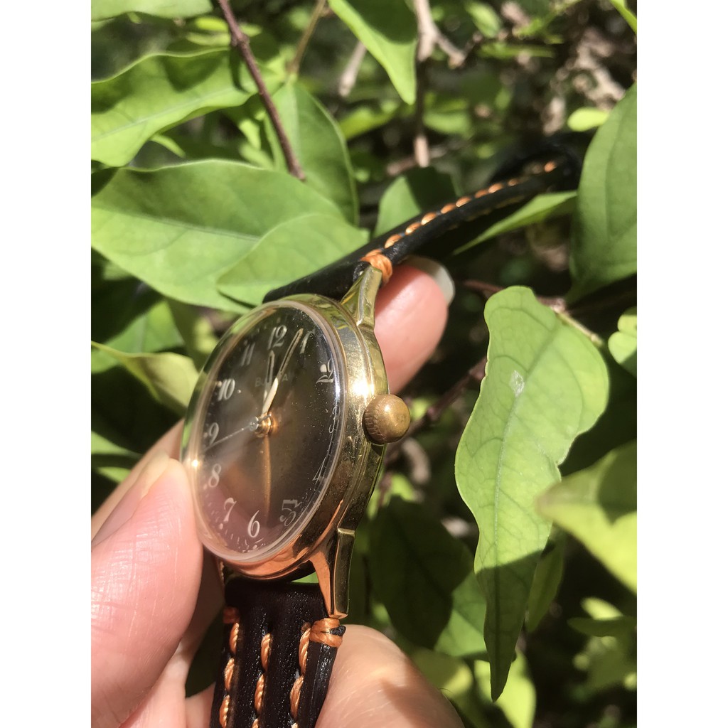 Đồng hồ nữ BULOVA cơ lên cót tay, máy vàng, mặt màu trà, niềng lắc kê vàng, dây da