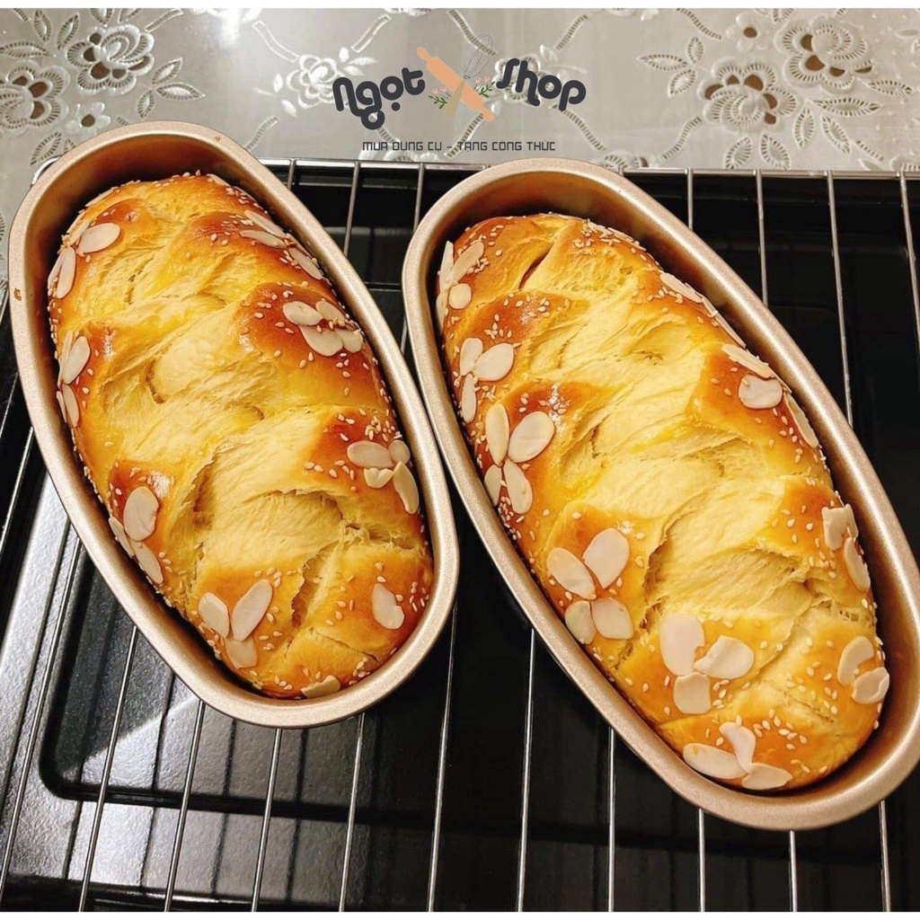 Khuôn ovan làm bánh mì hoa cúc chống đính 23cm