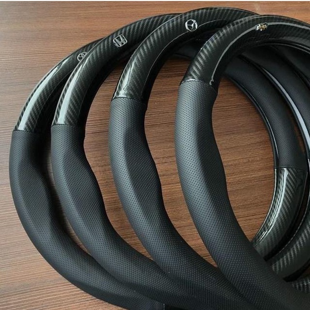 Bọc vô lăng CARBON phối da thoáng khí đủ các hãng xe Toyota-Honda-Hyundai-Mazda-KiA-Ford-Mitshubishi-Chevrolet cao cấp