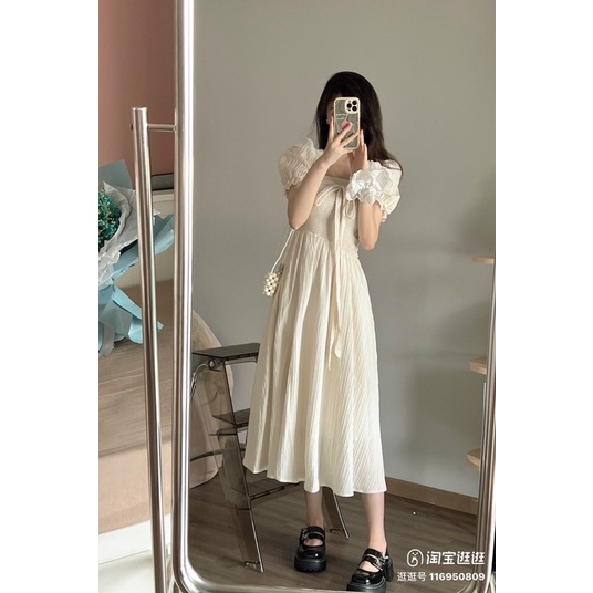 Đầm midi kem cổ vuông nhún ngực tay phồng xẻ tà cột nơ lưng