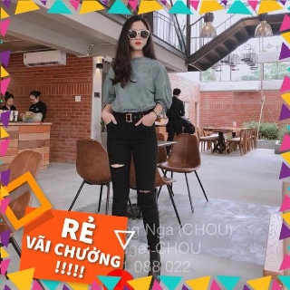 - Quần jean rách đường lệch