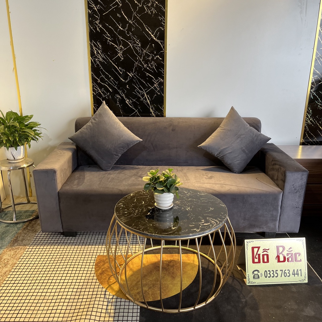 Chọn bộ ghế sofa khung gỗ tự nhiên bọc nỉ nhung màu sắc tùy chọn, có kèm bàn trà trắng tròn chân gỗ