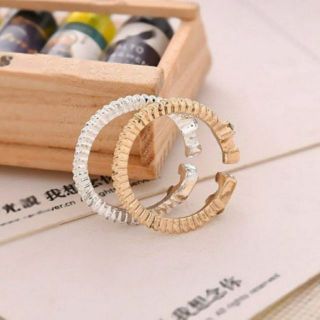Nhẫn hở đính đá hình nốt nhạc