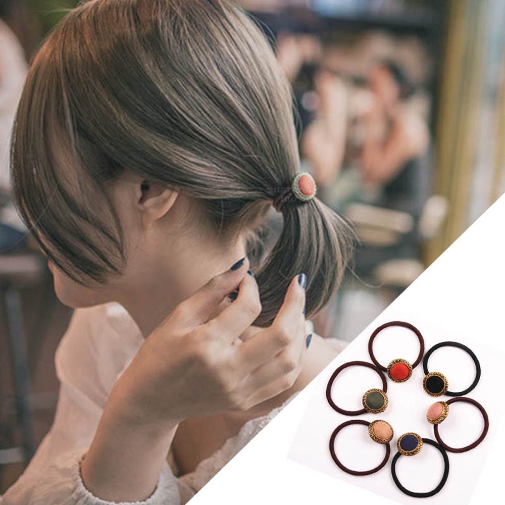 Cài tóc đính nút thời trang nữ tính