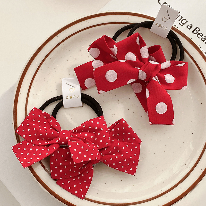 Thun cột tóc gắn nơ dễ thương phong cách Hàn Quốc