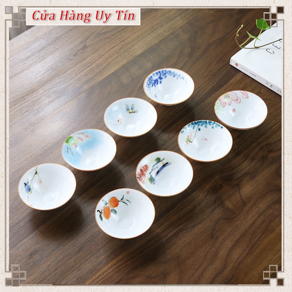 Bộ trà Chén nón Cảnh Đức vẽ thủ công, chất liệu sứ trắng sáng nổi rõ màu nước trà