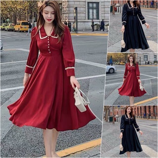 Đầm xòe phối nút