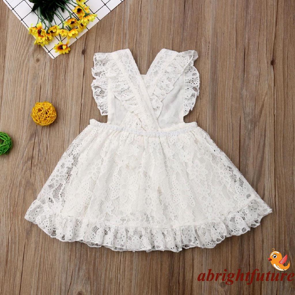 Đầm công chúa hở lưng màu trắng có ren cho bé gái