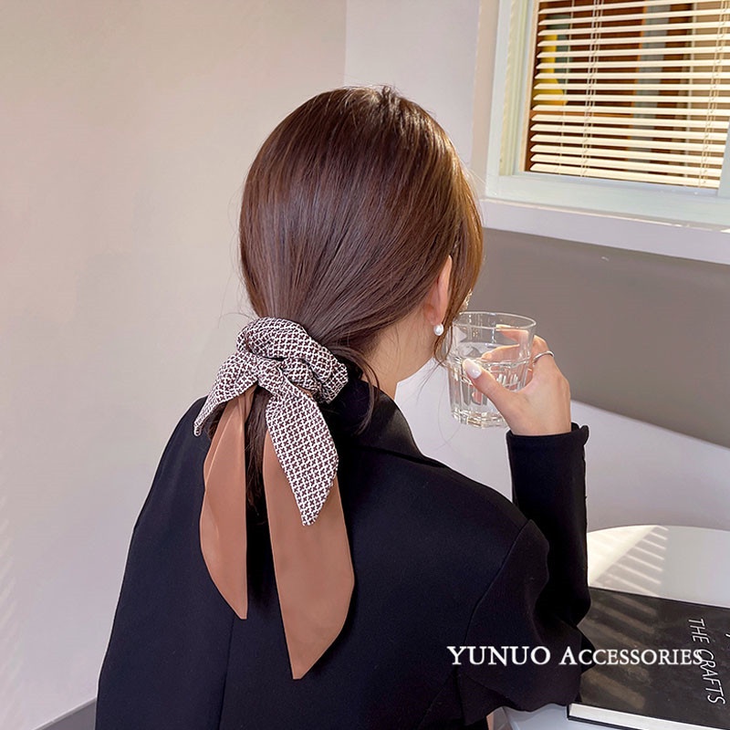 Dây buộc tóc kaki buộc nơ tua rua dễ thương cho phái nữ