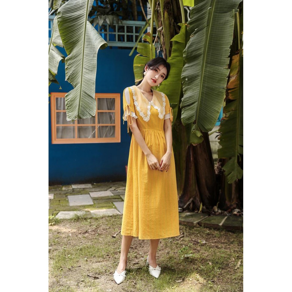 Đầm Vàng Thanh Tao Tay Cách Điệu - Thiết Kế - Hàng Cao Cấp