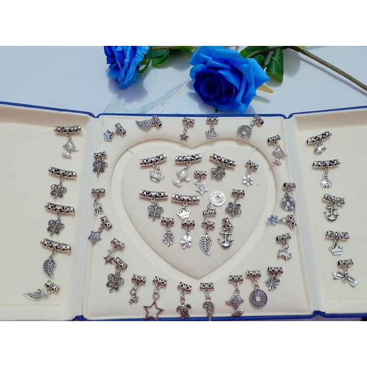 Charm bạc cổ có gắn hình treo sẵn : 1 gói 50g = 30k [ lấy 500g - 1kg liên hệ pm Shopee ]