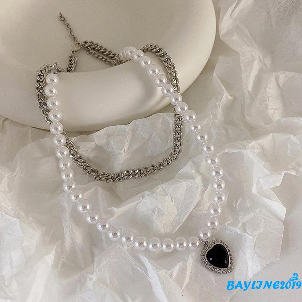 Vòng cổ Kim Loại Màu Đen Mặt Trái Tim Đính Đá Và Ngọc Trai Giả