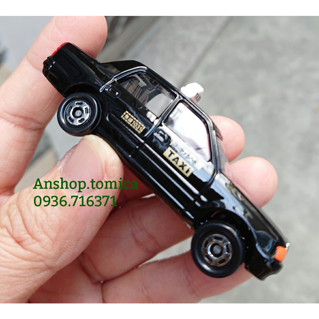 Mô hình xe T a x i Hong Kong màu đen mở được cửa tomica Nhật Bản