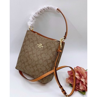 Túi Coach da thật pha canvas dáng ống màu mới