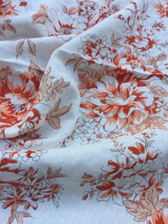 Vải linen bột hoa mẫu đơn màu cam đất.