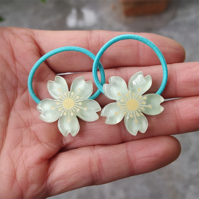 Set 2 dây buộc tóc co giãn đính bông hoa nhỏ đáng yêu dành cho bé gái