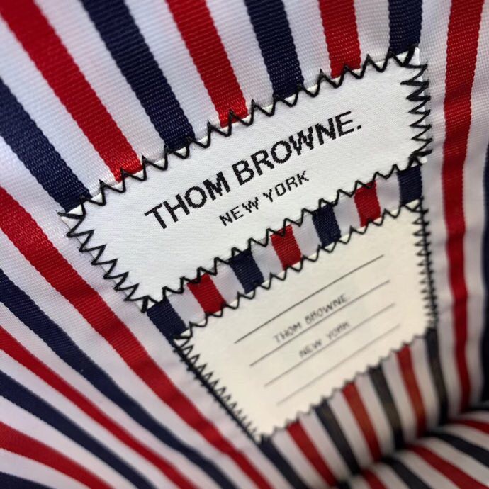 Ví cầm tay Thom Browne size 30*20