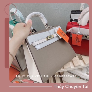 Túi cầm tay da sần size 25