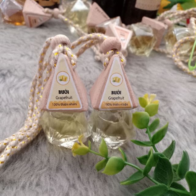 Xả sốc combo 2 lọ tinh dầu treo hương bưởi giúp thanh lọc không khí, thuê giãn. Mùi hương thích hợp cho mùa hè