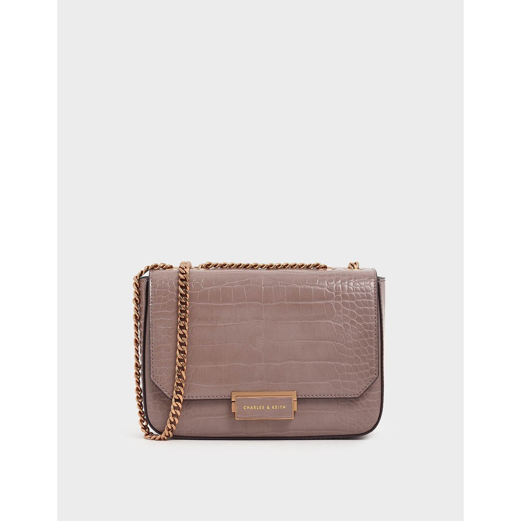 Túi Charles and Keith màu hồng da cá sấu CK227 (Hàng hãng xuất dư)