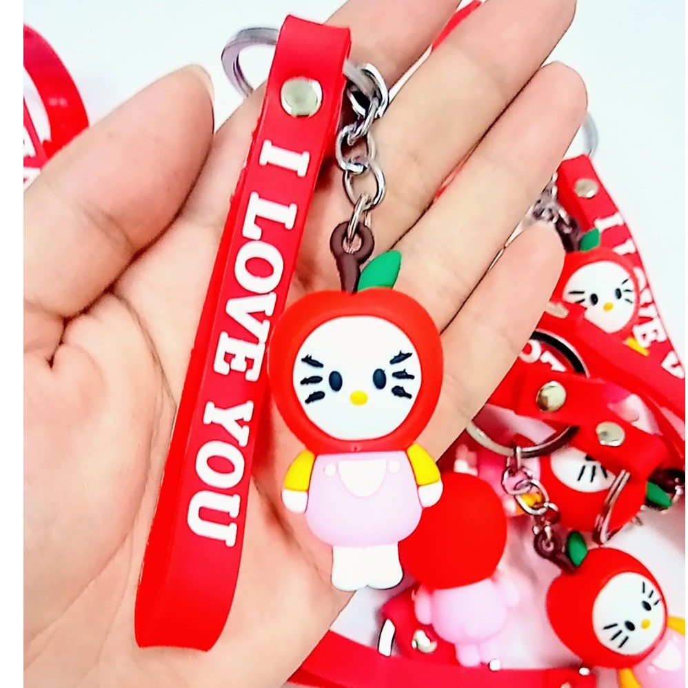 MÓC KHÓA KITTY ĐỘI QUẢ TÁO XINH