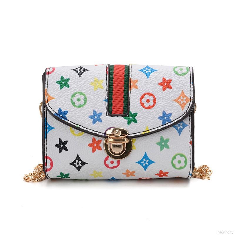 Túi đeo chéo mini bằng da PU họa tiết hoa dành cho bé gái
