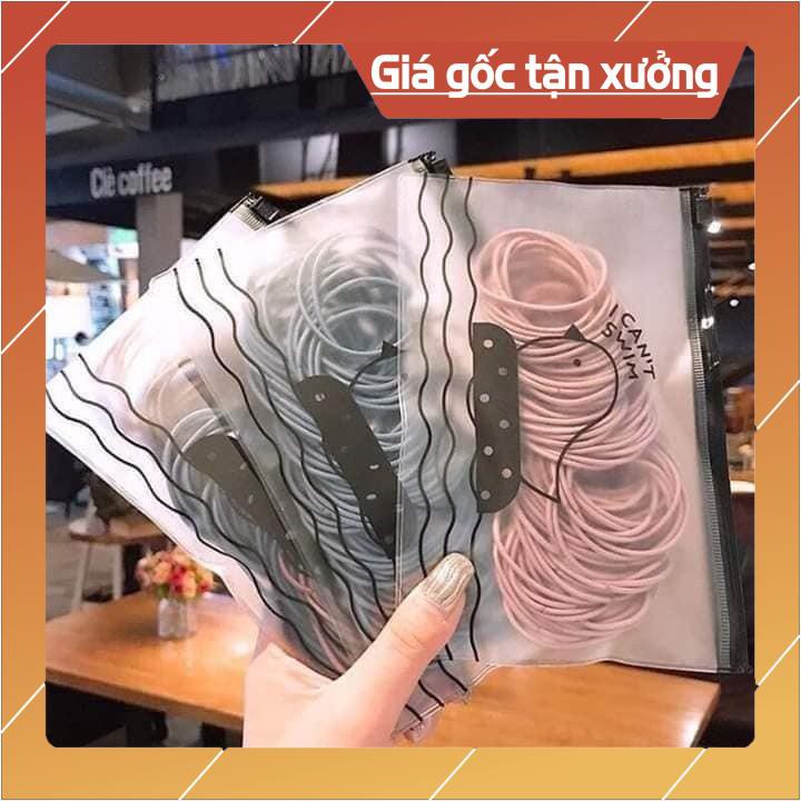 Buộc tóc 100 cái có túi zip đựng tiện lơi