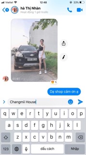 Chân váy kaki lệch tà phối nịt khoen bụng