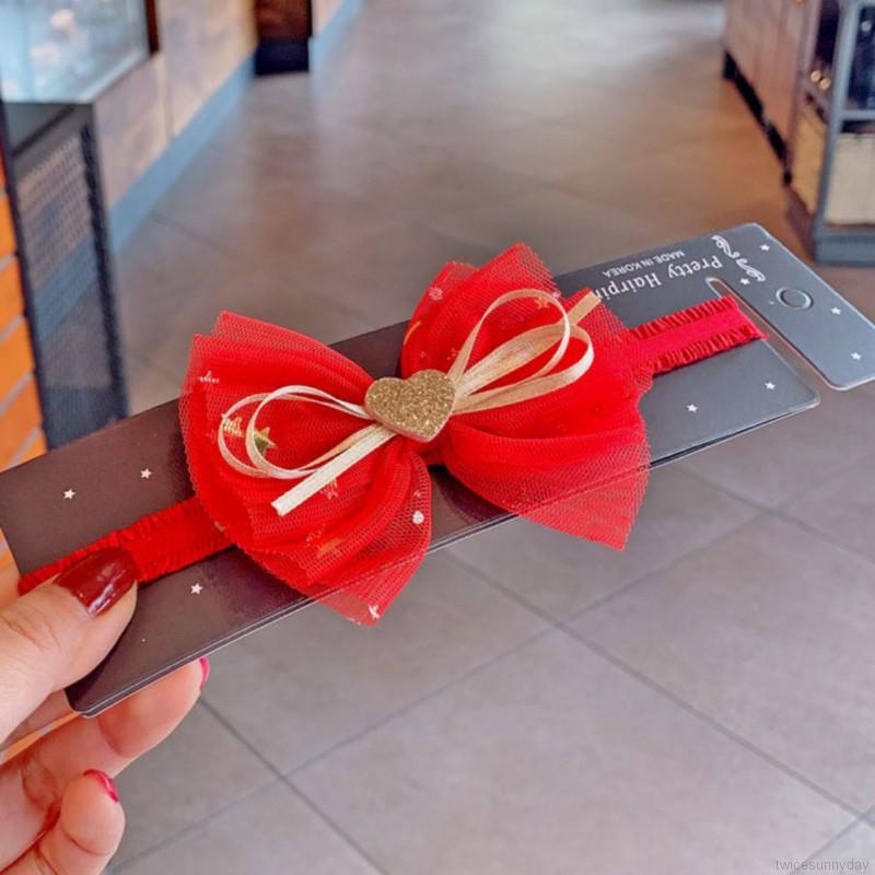 Băng đô cài tóc chúc mừng năm mới cho bé gái