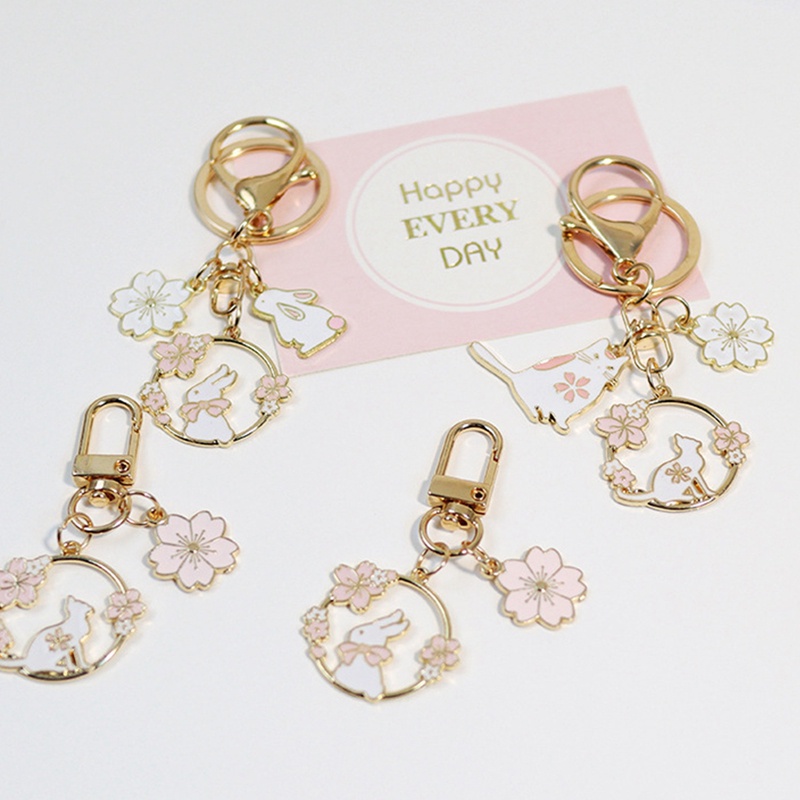 Móc Khóa Hình Thỏ Và Hoa Anh Đào Dễ Thương